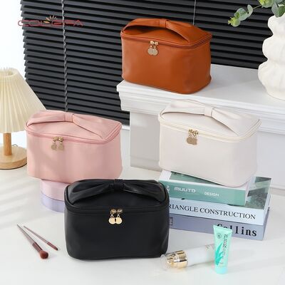 PU Soft Leather New Arrival Travel Portable Makeup Bags Storage Large Capacity Waterproof Stylish Bow Handle Cosmetic Bag