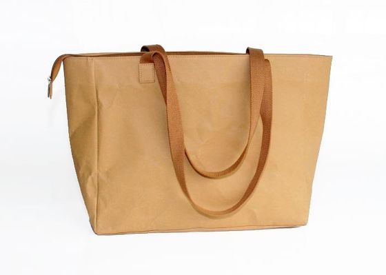 Duurzame Bruine Wasbare Tote Bags Kraft Paper Shopping-Zwerfstershandtassen met douaneembleem